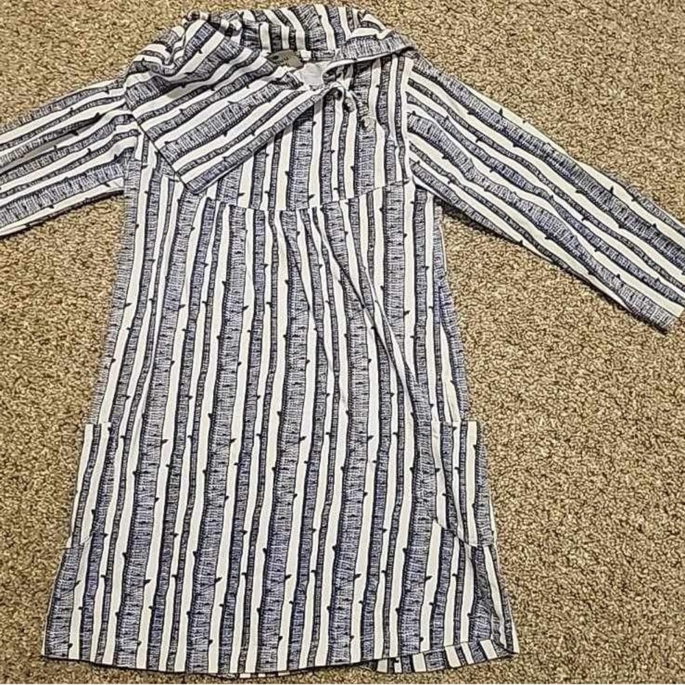 Kate Quinn signature dress